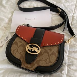 COACH Georgie Saddle Bag In Colorblock Signature Canvas With Rivets